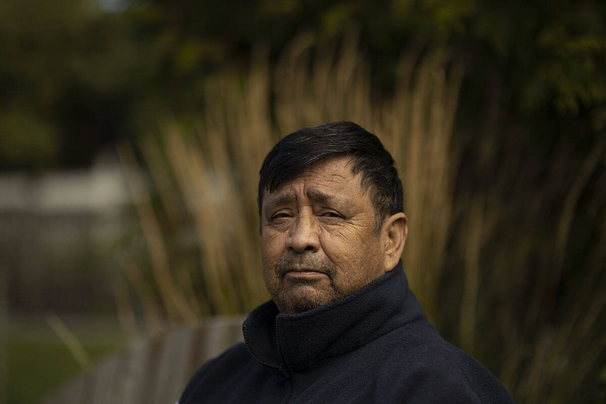 Nanaimo Indian Hospital survivor Melven <ins>(Sx̄wen)</ins> Jones recounts the abuse he endured at six years old, as he sits outside his home in Victoria. (Arnold Lim/Black Press Media)