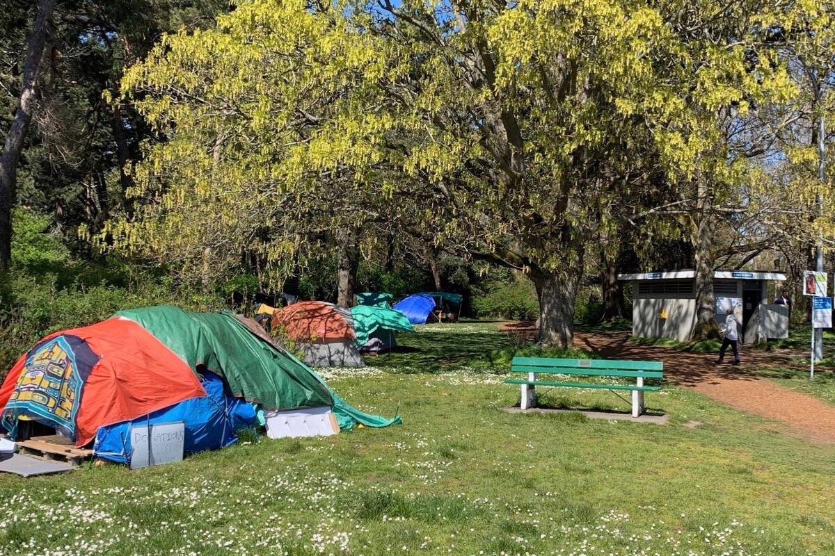 Tent camp at Beacon Hill Park in Victoria, April 2021. B.C. communities are struggling with COVID-19 infection among people living in tents or on the street. (Tom Fletcher/Black Press)