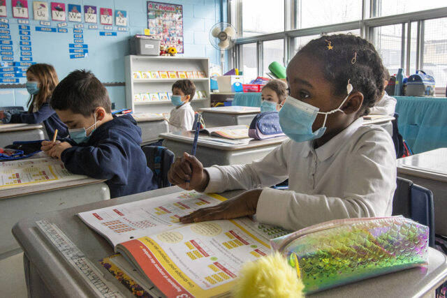 FILE – Grade one students wear masks as they attend class at Honore Mercier elementary school Tuesday, March 9, 2021 in Montreal.THE CANADIAN PRESS/Ryan Remiorz