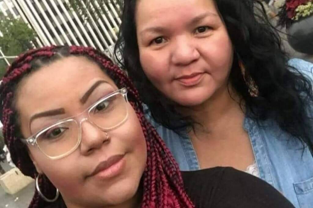 Jennifer Rosebluff-Thomas, left, poses with her sister Carol Charles in this undated handout photo. Rosebluff-Thomas died of COVID-19 last month. She was about 29 weeks pregnant with her ninth child. She was also unvaccinated and contracted the more dangerous Delta variant. THE CANADIAN PRESS/HO, Carol Charles