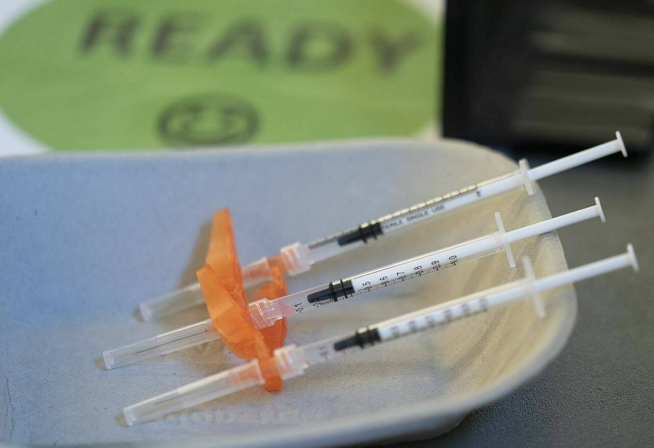 Syringes of COVID-19 vaccine are seen at a vaccination clinic run by Vancouver Coastal Health, in Richmond, B.C., Saturday, April 10, 2021. THE CANADIAN PRESS/Jonathan Hayward