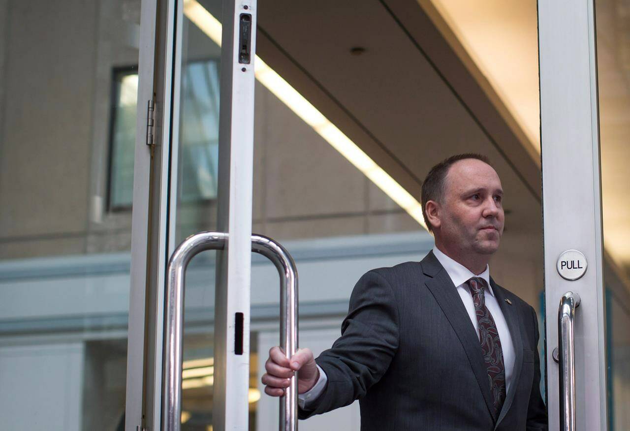 B.C. Liberal MLA Mike Bernier arrives for a news conference in Vancouver on Thursday January 14, 2016. THE CANADIAN PRESS/Darryl Dyck