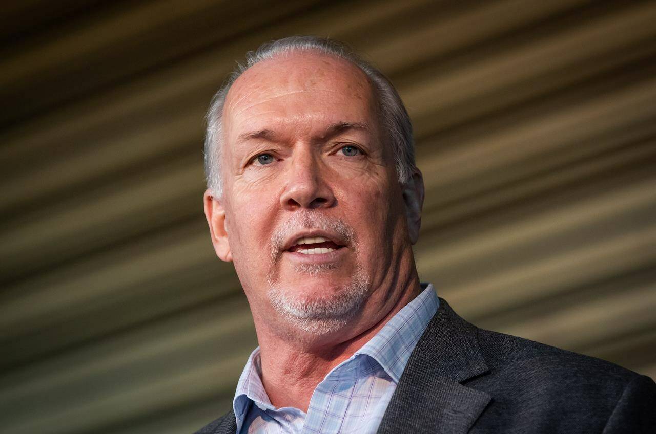 B.C. Premier John Horgan speaks after the B.C. Lions CFL football team announced they would recognize the first National Day for Truth and Reconciliation in Vancouver on Thursday, September 16, 2021. THE CANADIAN PRESS/Darryl Dyck