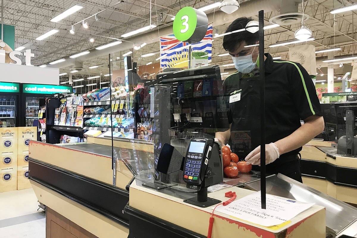 Grocery stores, libraries and other indoor public spaces in B.C. are again subject to a mandatory mask order that will soon extend to age five and up. (The Canadian Press)