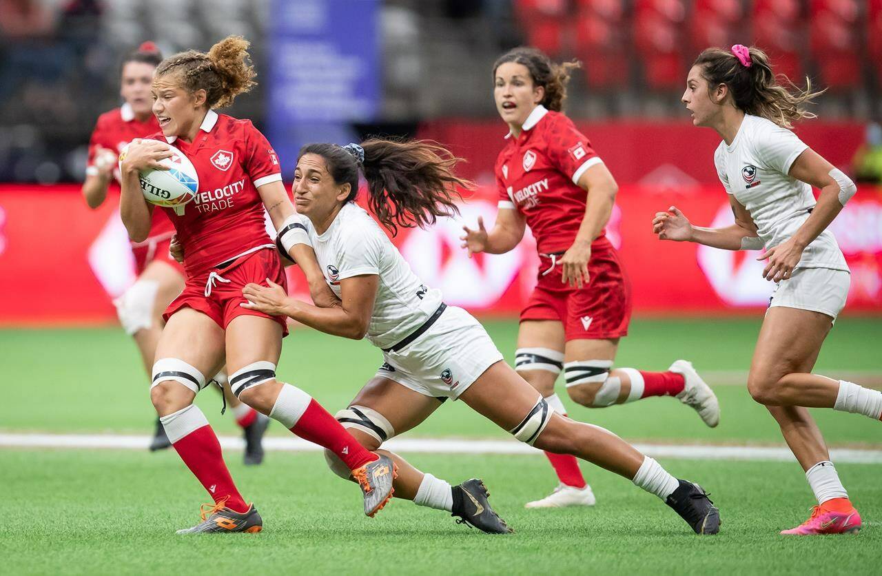 Canada’s Renee Gonzalez, left, is tackled by United States’ Sarah Levy during HSBC Canada Sevens women’s semifinal rugby action, in Vancouver, on Sunday, September 19, 2021. THE CANADIAN PRESS/Darryl Dyck
