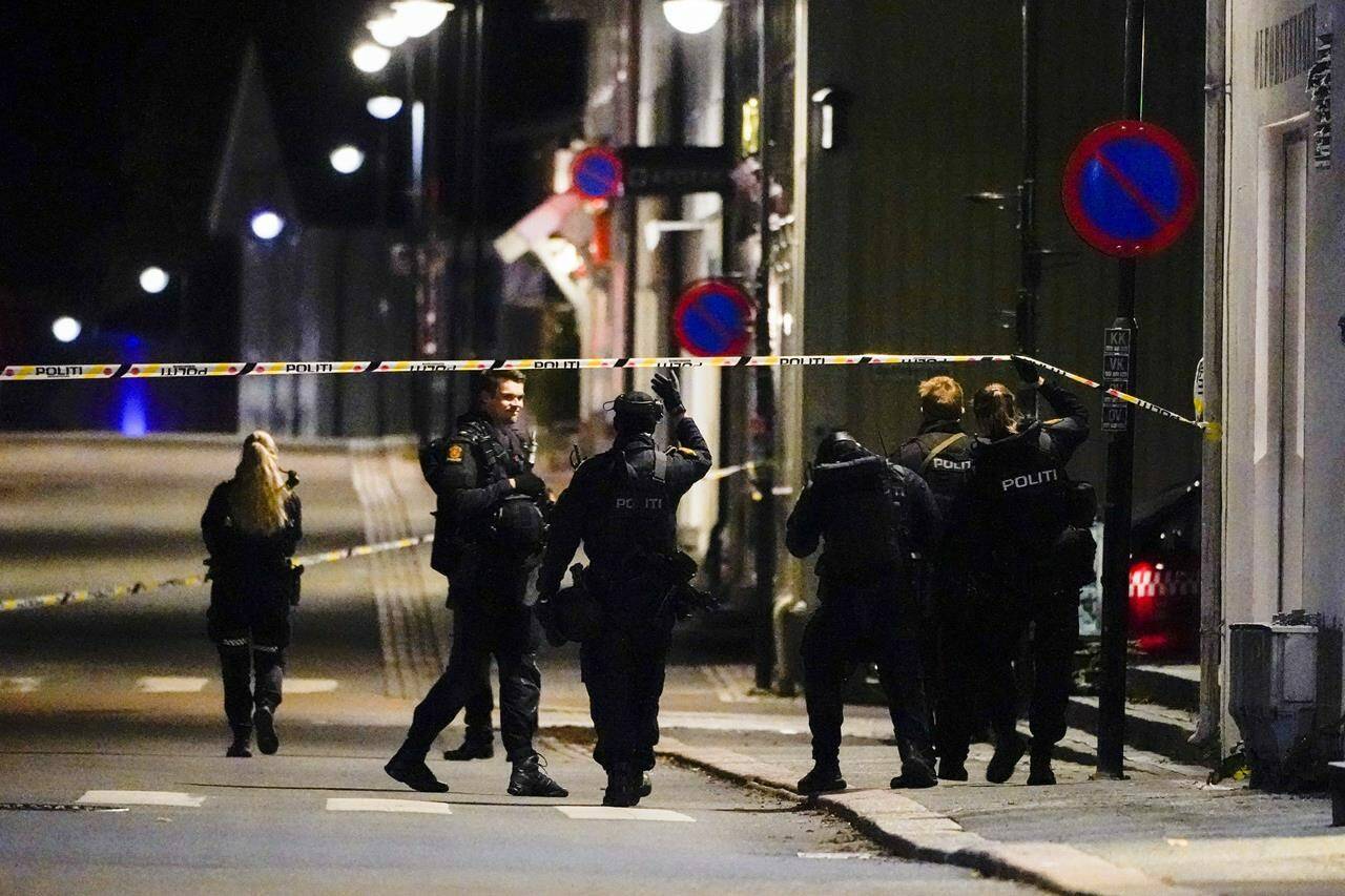 Police at the scene after an attack in Kongsberg, Norway, Wednesday, Oct. 13, 2021. Several people have been killed and others injured by a man armed with a bow and arrow in a town west of the Norwegian capital, Oslo. (Hakon Mosvold Larsen/NTB Scanpix via AP)