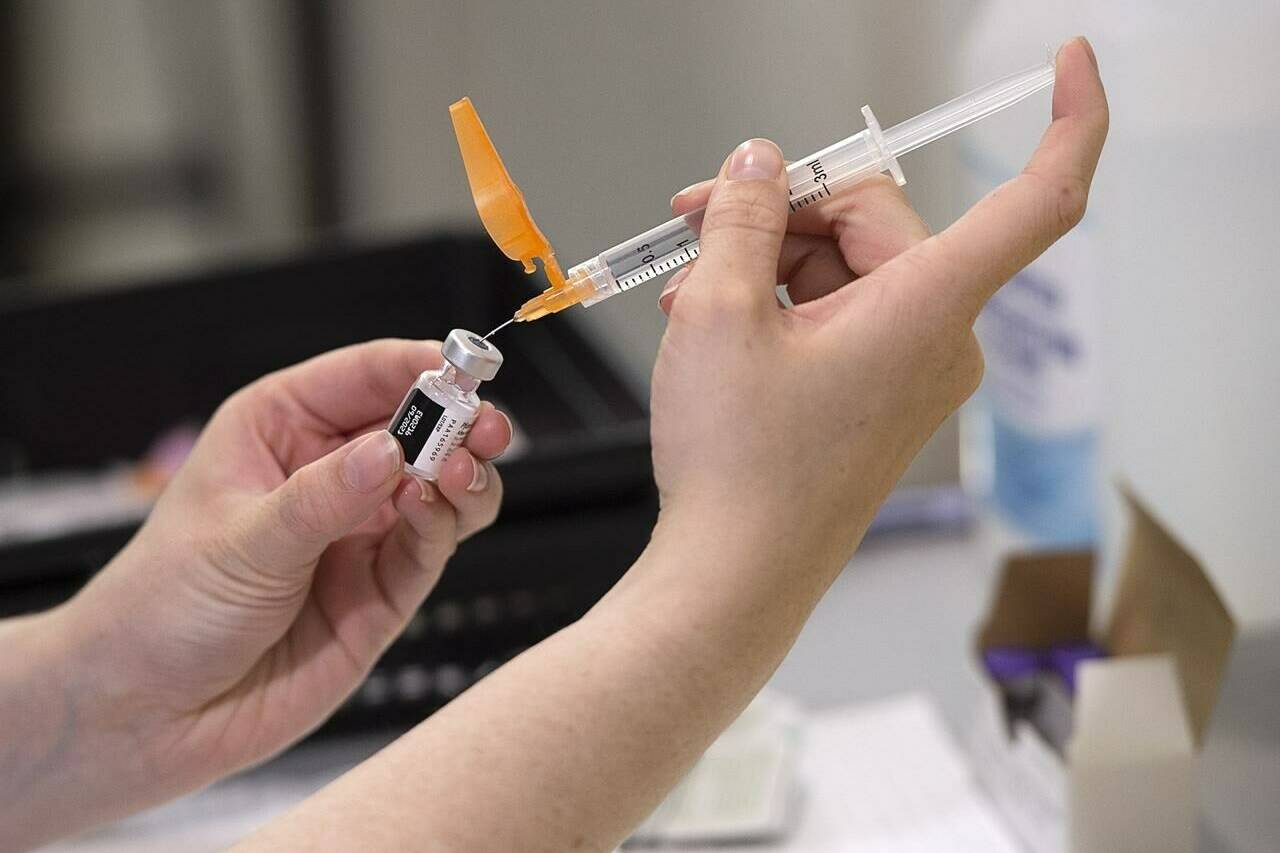 A vaccine is prepared at a clinic in Dartmouth, N.S. on Thursday, June 3, 2021. THE CANADIAN PRESS/Andrew Vaughan