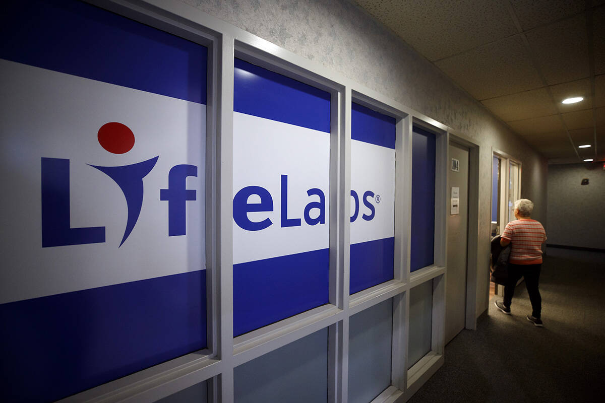 FILE – LifeLabs signage is seen outside of one of the lab’s Toronto locations, Tuesday, Dec. 17, 2019. THE CANADIAN PRESS/Cole Burston