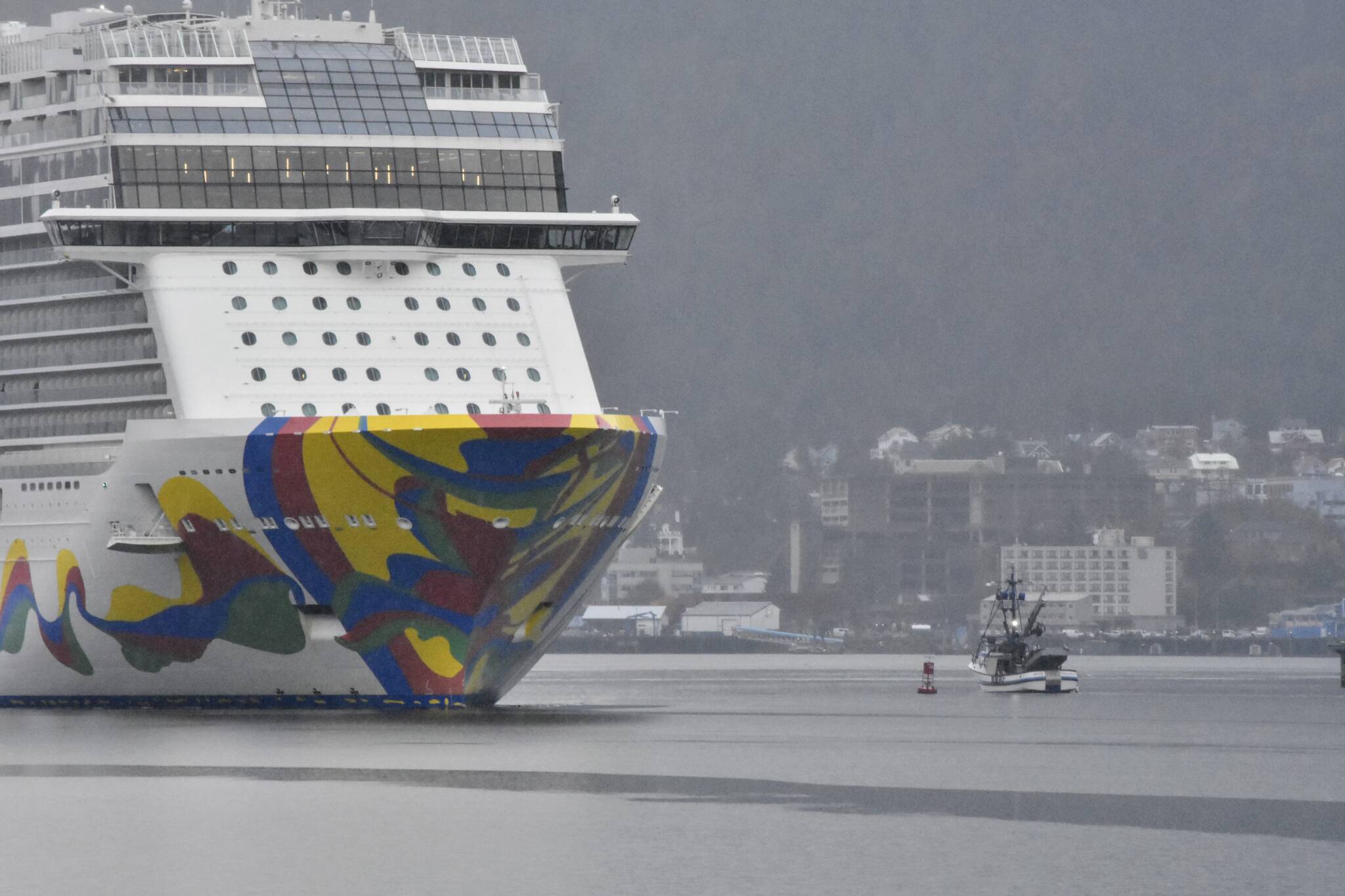 The last cruise ship of the year, the Norwegian Encore, sails out of Juneau on Wednesday, Oct., 20, 2021, ending a cruise ship season that almost didn’t happen. Despite other warnings lifting, Canadians are still advised to avoid cruise ship travel. (Peter Segall / Juneau Empire)