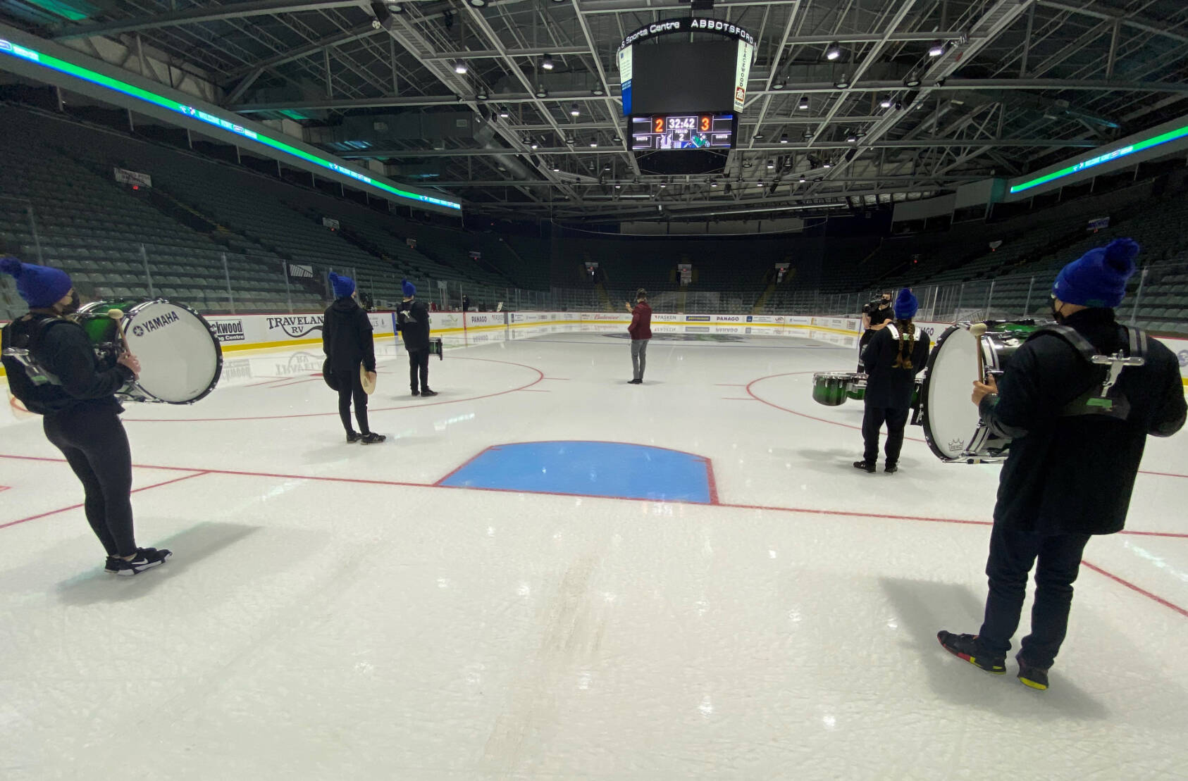 Members of the Sardis Drumline on the ice at an empty Abbotsford Centre prior to Friday night’s American Hockey League game. (submitted photo)