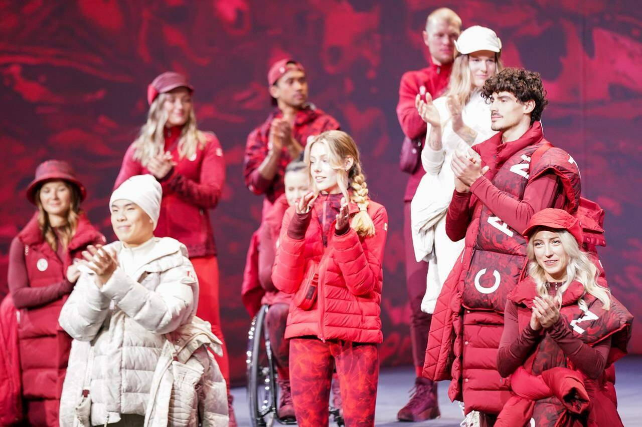 Canadian Olympians and Paralympians gather on stage at the Team Canada x Lululemon Athlete Kit Reveal in Toronto on Tuesday, October 26, 2021. Lululemon will outfit Canada’s Olympic and Paralympic athletes starting with the upcoming Winter Games in Beijing. THE CANADIAN PRESS/Evan Buhler