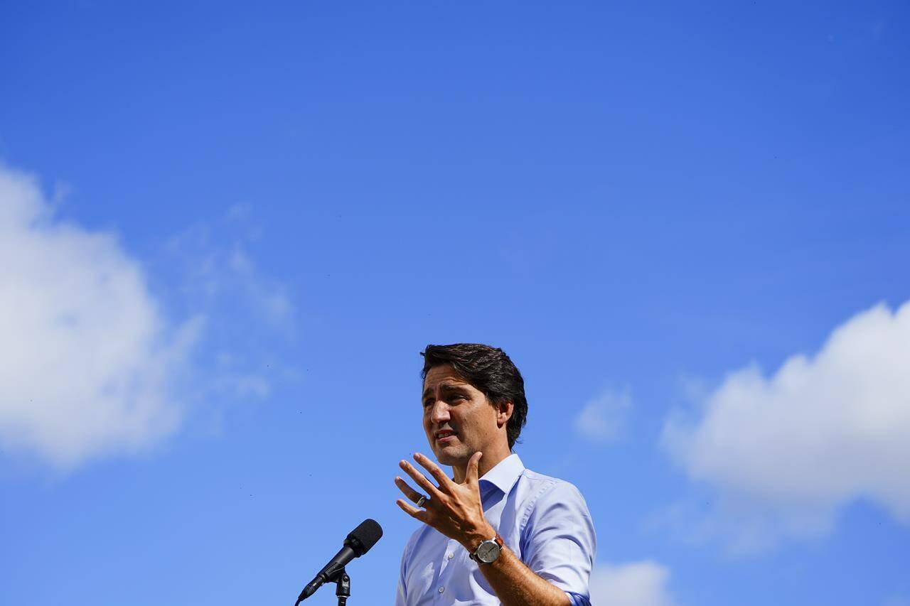 Prime Minister Justin Trudeau speaks to media as he visits a vaccine clinic in Ottawa on Tuesday, Sept. 28, 2021. A new analysis suggests the Liberal climate plan could meet Canada's greenhouse gas emissions targets for the first time before the end of this decade. THE CANADIAN PRESS/Sean Kilpatrick