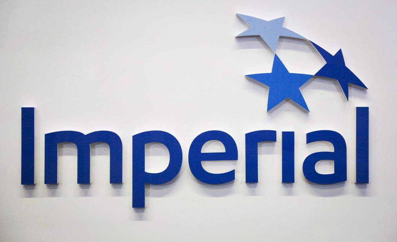 Imperial Oil Ltd. earned a profit of $908 million as it reported its highest third-quarter production in more than 30 years and benefited from higher oil prices. Imperial Oil logo at the company’s annual meeting in Calgary on April 28, 2017. THE CANADIAN PRESS/Jeff McIntosh