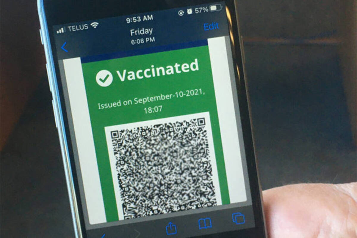 B.C. vaccine card on a smartphone, green indicates two doses. (Black Press Media)