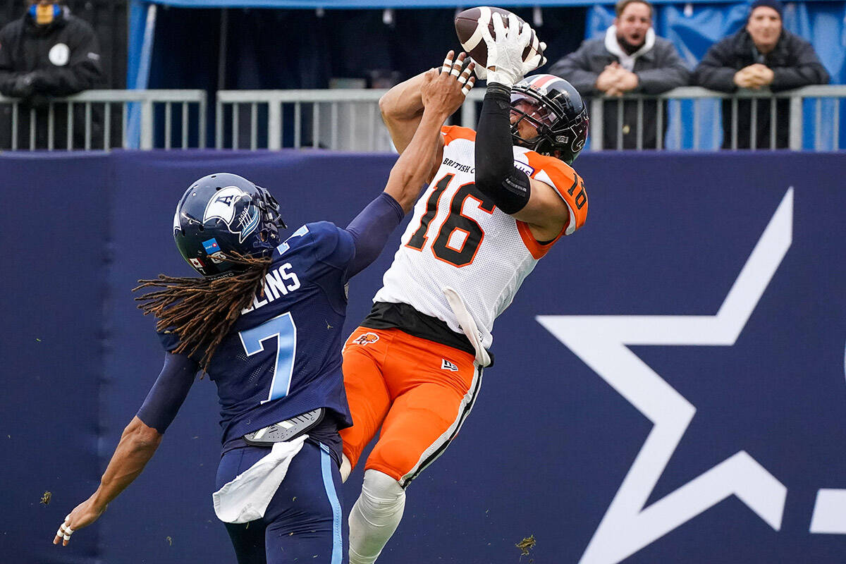 B.C. Lions wide receiver Bryan Burnham (16) makes a touchdown catch as he his defended by Toronto Argonauts defensive back Jalen Collins (7) during first half CFL action in Toronto on Saturday, Oct. 30, 2021. THE CANADIAN PRESS/Evan Buhler