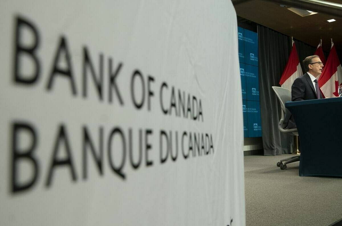 Bank of Canada Governor Tiff Macklem speaks during a news conference, in Ottawa, Wednesday, Oct. 27, 2021. The Bank of Canada’s move to end its pandemic-driven purchases of government bonds to stimulate the economy, and warnings of rate hikes sooner than previously expected, has coloured federal efforts to craft an annual plan to mange the debt. THE CANADIAN PRESS/Adrian Wyld