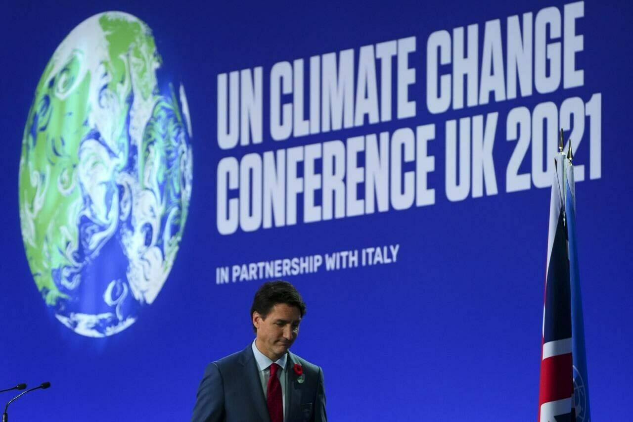 Prime Minister Justin Trudeau leaves the stage after he delivered a short speech at the 26th meeting of the Council of Parties to the UN climate convention, known as COP26, in Glasgow, Scotland, on Monday, Nov. 1, 2021. THE CANADIAN PRESS/Sean Kilpatrick
