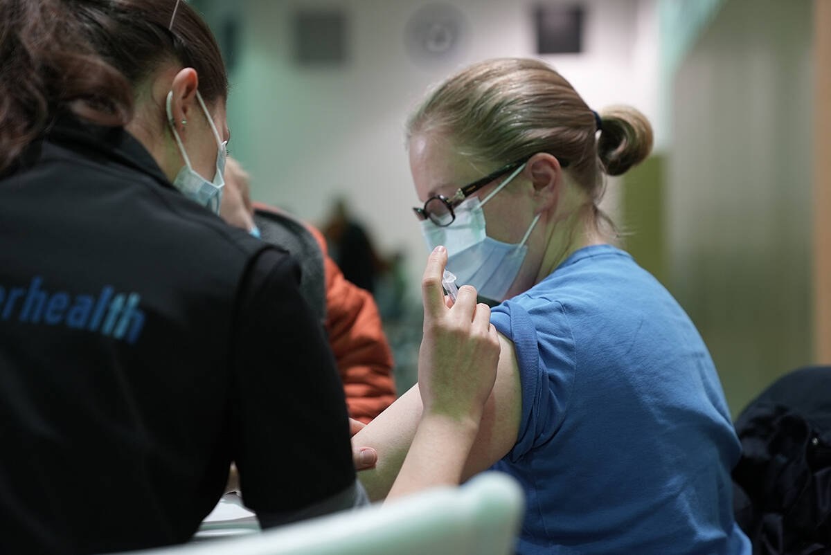 Surrey teacher Shannon Akester gets vaccinated for COVID-19 at the North Surrey clinic on Wednesday, March 24. (submitted photo: Fraser Health)