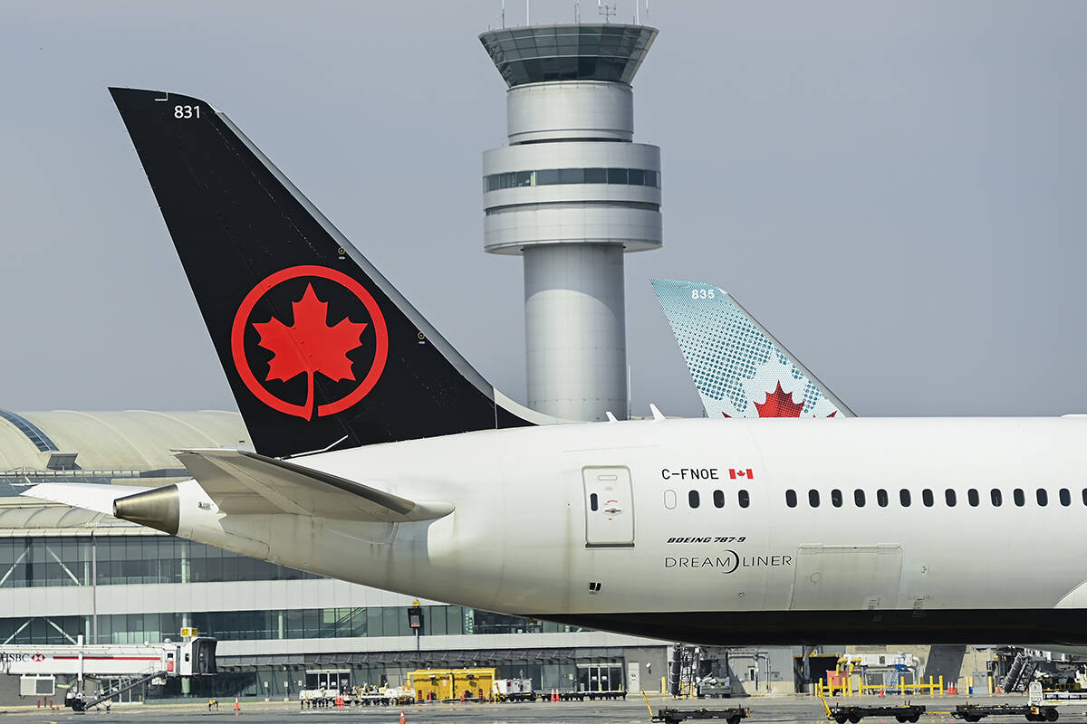 Air Canada planes sit on the tarmac at Pearson International Airport  during the COVID-19 pandemic in Toronto on Wednesday, April 28, 2021. THE CANADIAN PRESS/Nathan Denette