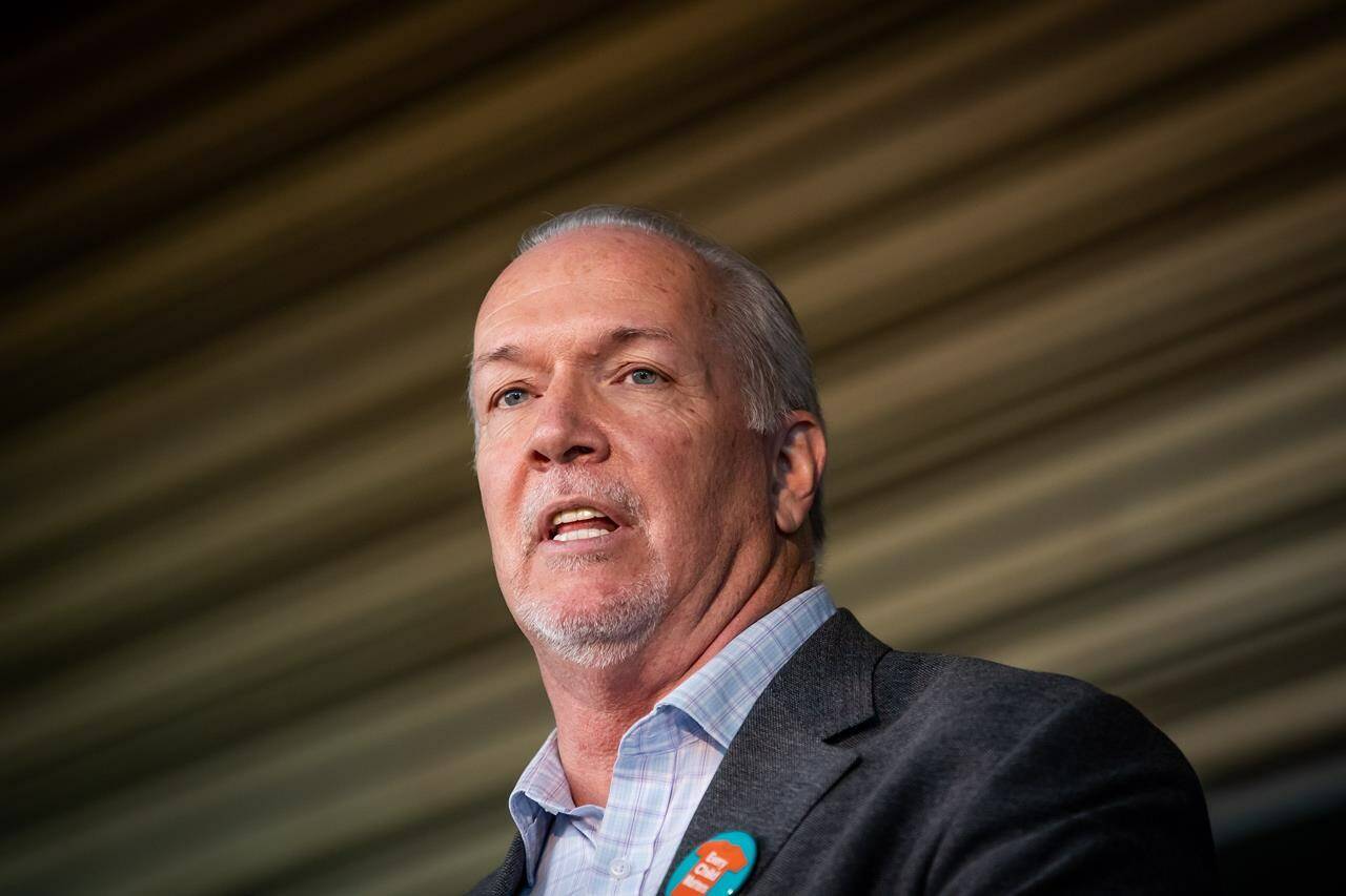 B.C. Premier John Horgan speaks after a B.C. Lions CFL football team new conference in Vancouver on Thursday, September 16, 2021. THE CANADIAN PRESS/Darryl Dyck