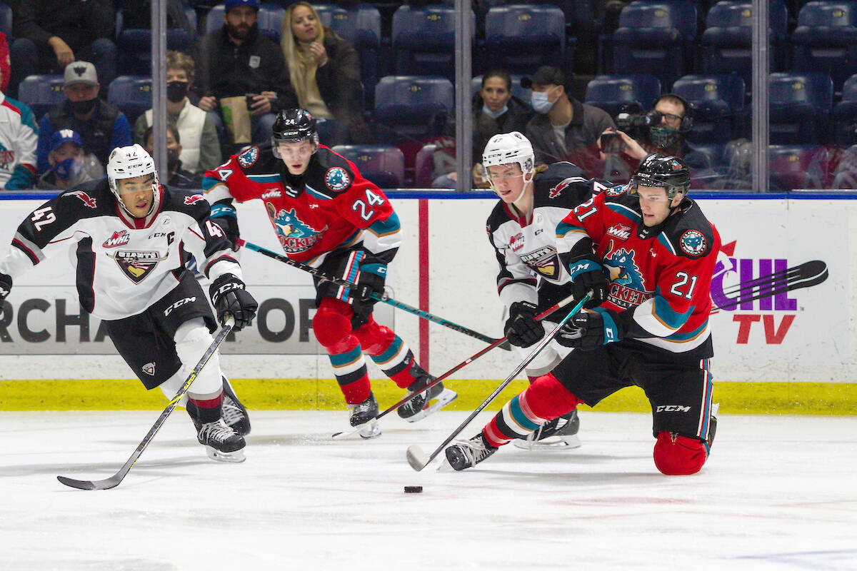 Vancouver Giants Justin Sourdif and Mazden Leslie attempt to out skate members of the Kelowna Rockets Wednesday. (Steve Dunsmoor/Special to Langley Advance Times)