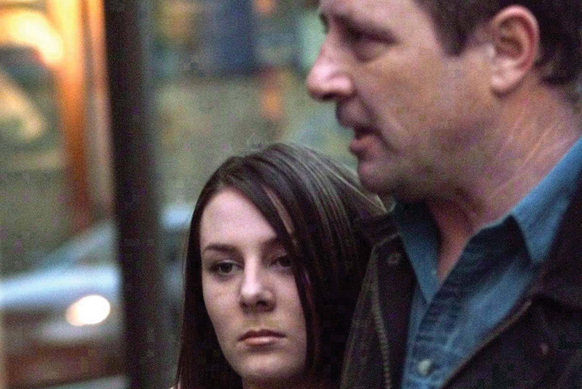 Kelly Ellard and her father Lawrence leave the Vancouver courthouse in this file photo. Ellard has had her parole reinstated after a previous suspension, and is serving a life sentence for the second-degree murder of a teen in 1997. (Photo by THE CANADIAN PRESS)