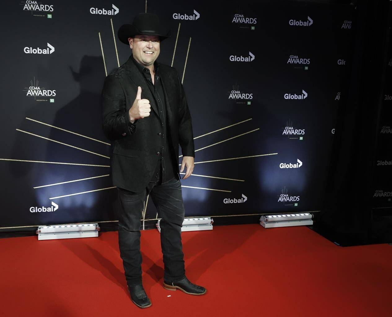 Gord Bamford poses on the red carpet at the Canadian Country Music Awards in Calgary, Sunday, Sept. 8, 2019. Bamford says he will give unvaccinated fans COVID-19 rapid antigen tests before they attend his concerts and set up mobile testing sites in communities the day before his shows. THE CANADIAN PRESS/Jeff McIntosh