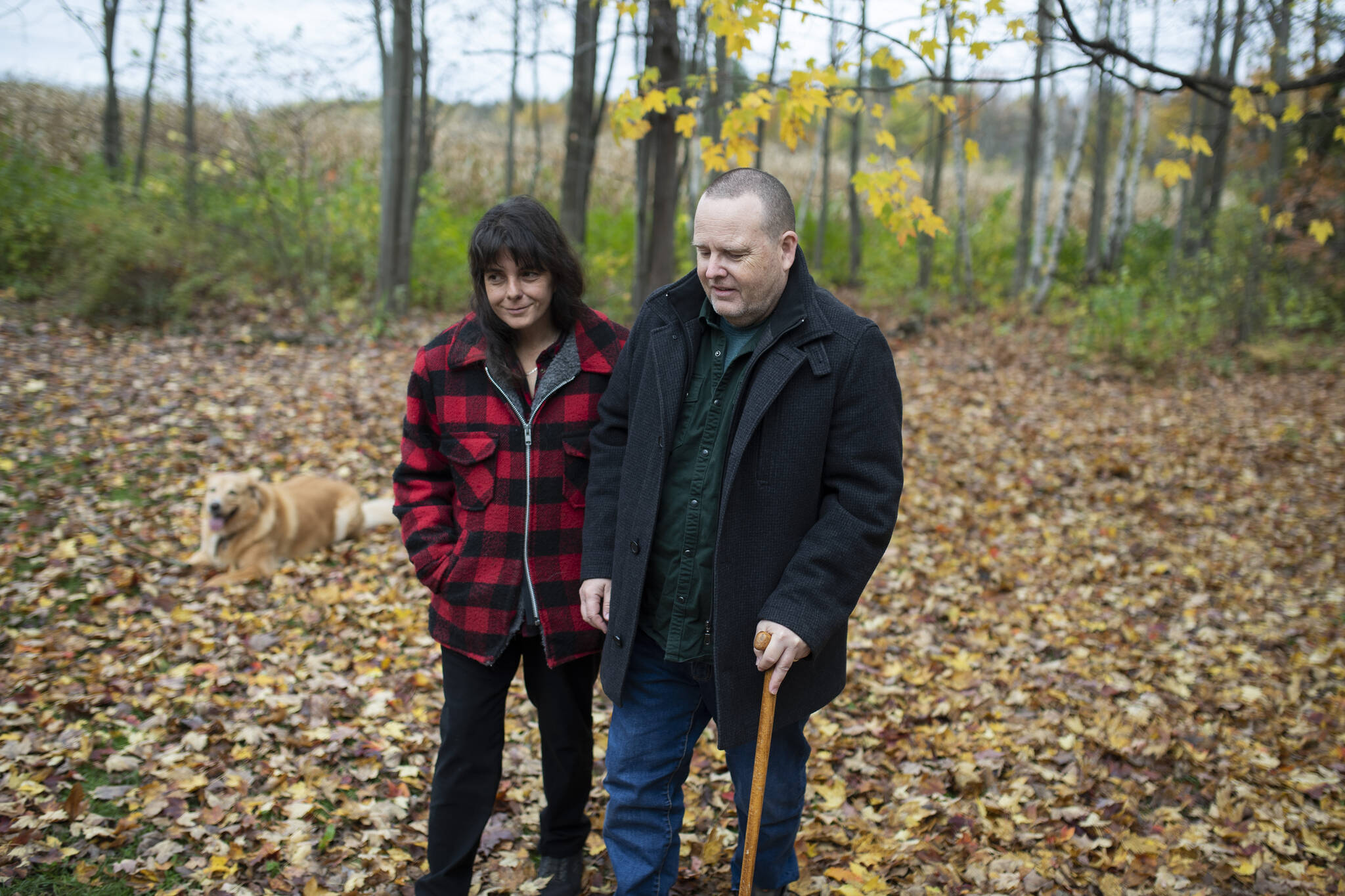 Veteran Jeffrey Shepherd walks back to the house with his wife Christine from their backyard in Casselman, Ont., on Friday, Oct. 22, 2021. THE CANADIAN PRESS/Justin Tang