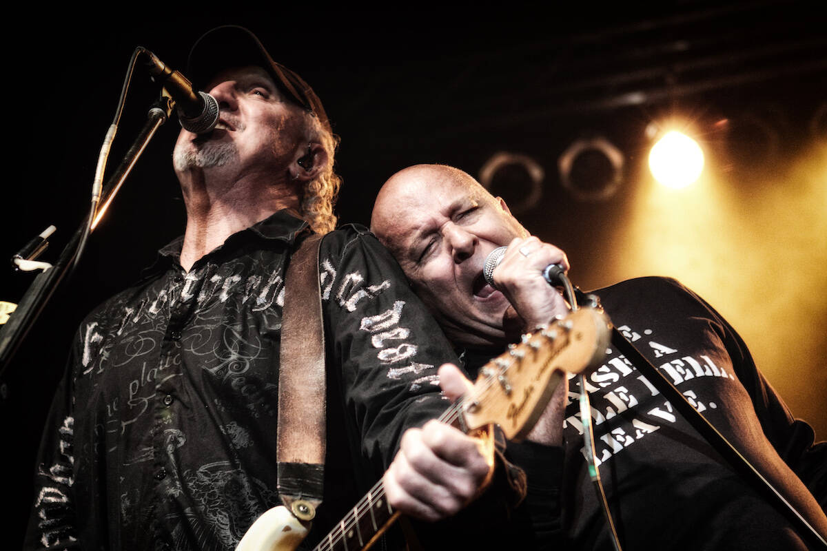 Guitarist Brian “Smitty” Smith and singer Ra McGuire on stage with Trooper. (Photo: Stan Pietrusik/trooper.com)