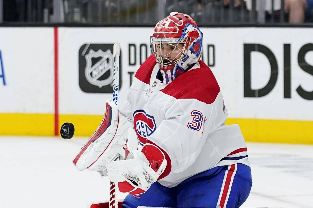 Montreal Canadiens goaltender Carey Price blocks a shot during the second period in Game 2 of an NHL hockey Stanley Cup semifinal playoff series against the Vegas Golden Knights, Wednesday, June 16, 2021, in Las Vegas. (AP Photo/John Locher)