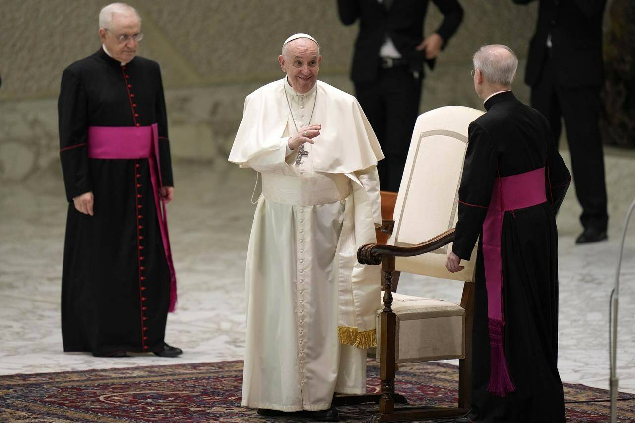 Pope Francis salutes bishops as he arrives for his weekly general audience in the Paul VI Hall, at the Vatican, Wednesday, Nov. 10, 2021. THE CANADIAN PRESS/AP, Alessandra Tarantino
