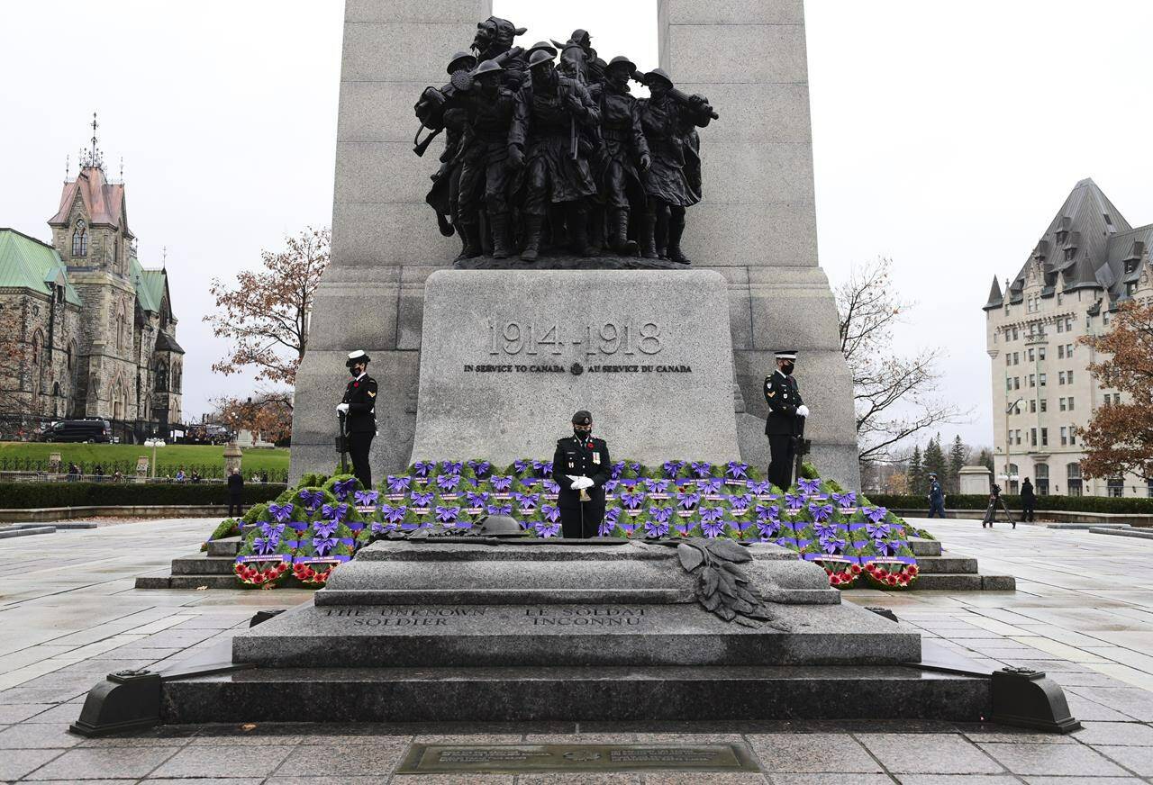 Sentinels stand guard during the Remembrance Day ceremony at the National War Memorial in Ottawa on November 11, 2020. THE CANADIAN PRESS/Sean Kilpatrick