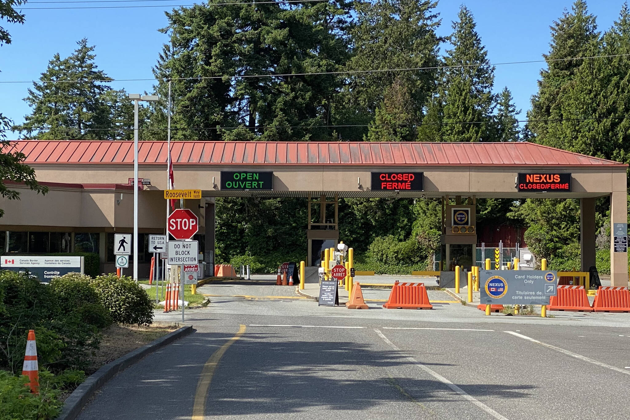 Exit lanes from Point Roberts, Wash., sit empty at the local Canadian border station, which was shut down to all but essential travel during the pandemic. Richard Read | Los Angeles Times