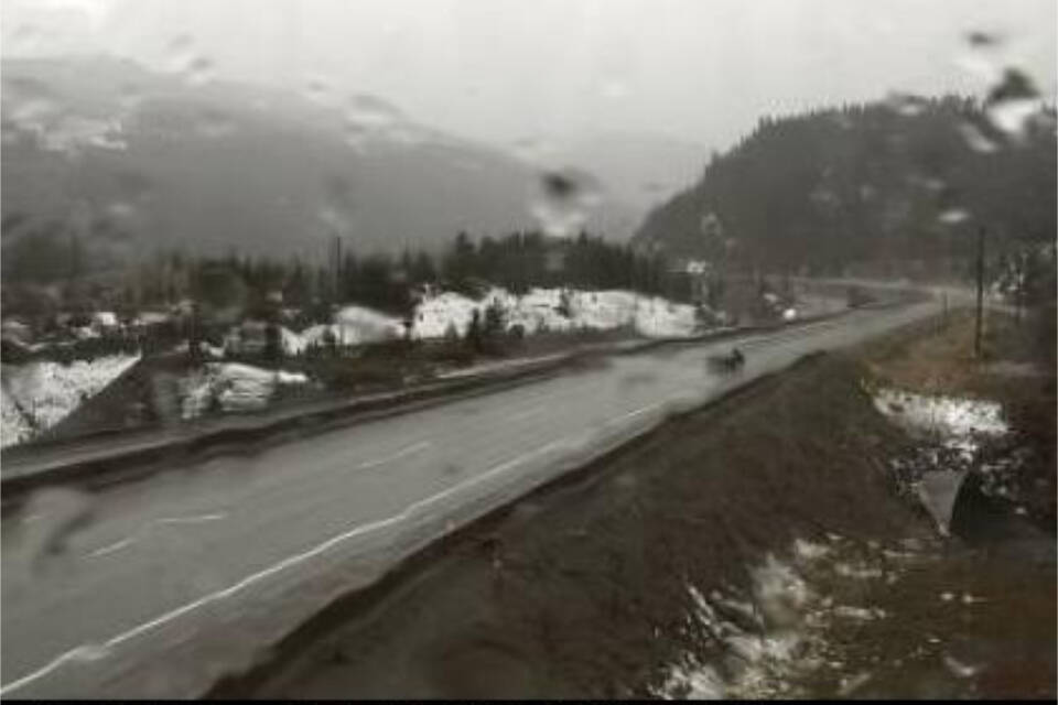 Web cam showing a rainy Larsen Hill on the Coquihalla at 11 a.m. Sunday, Nov. 14. Environment Canada warning of possible flash floods and water pooling on roads. (BC Highways)