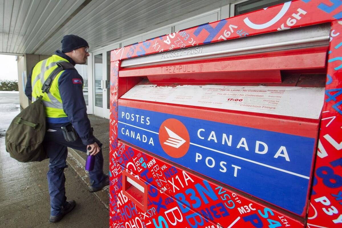 With multiple road closures in B.C. affecting transportation of mail across Western Canada, Canada Post is warning customers that deliveries may be delayed. (THE CANADIAN PRESS/Ryan Remiorz)