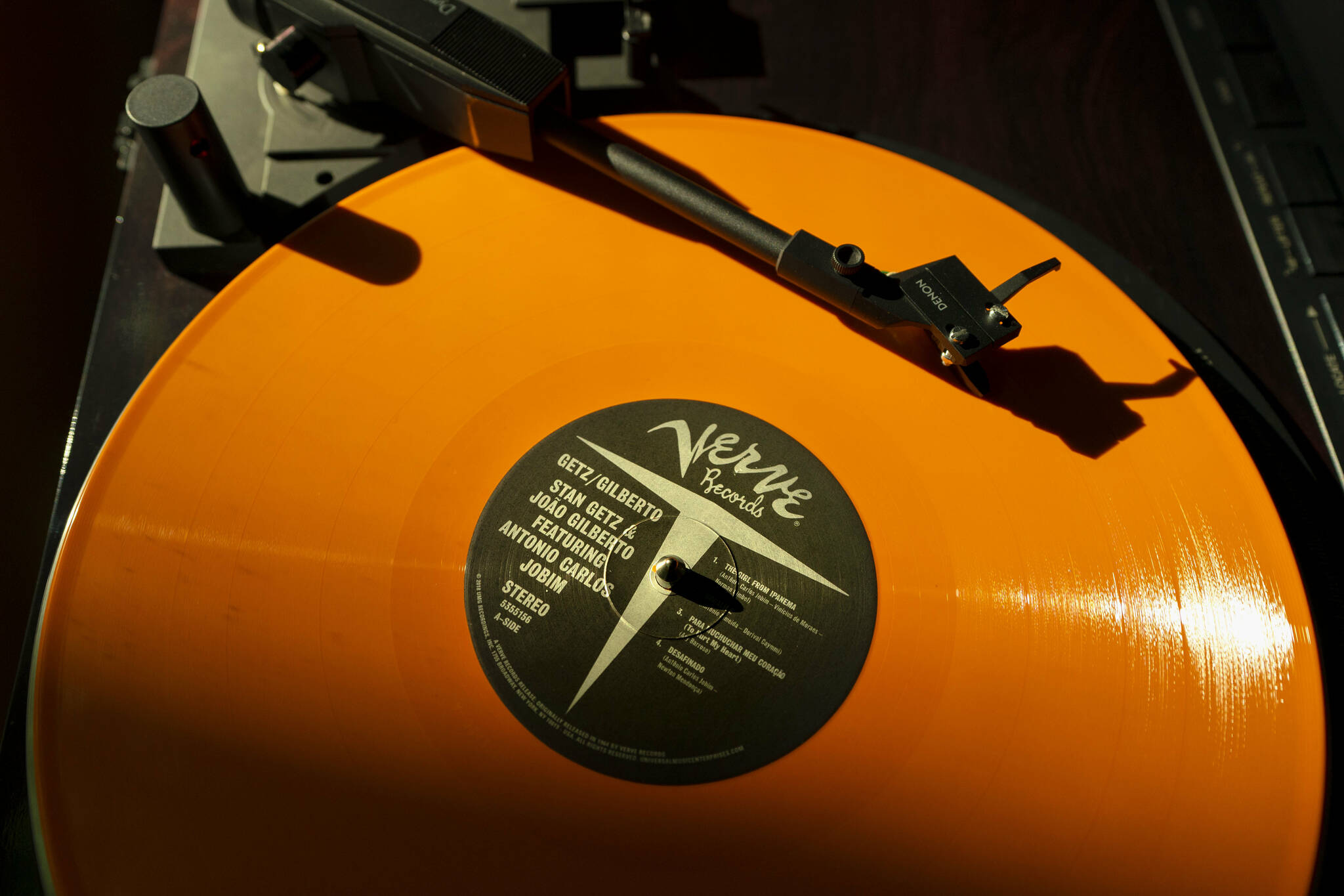 A vinyl record by The Verve plays on a turntable, Thursday, May 27, 2021, in Falmouth, Maine. The COVID-19 pandemic benefitted record store owners who saw a surge in sales. (AP Photo/Robert F. Bukaty)
