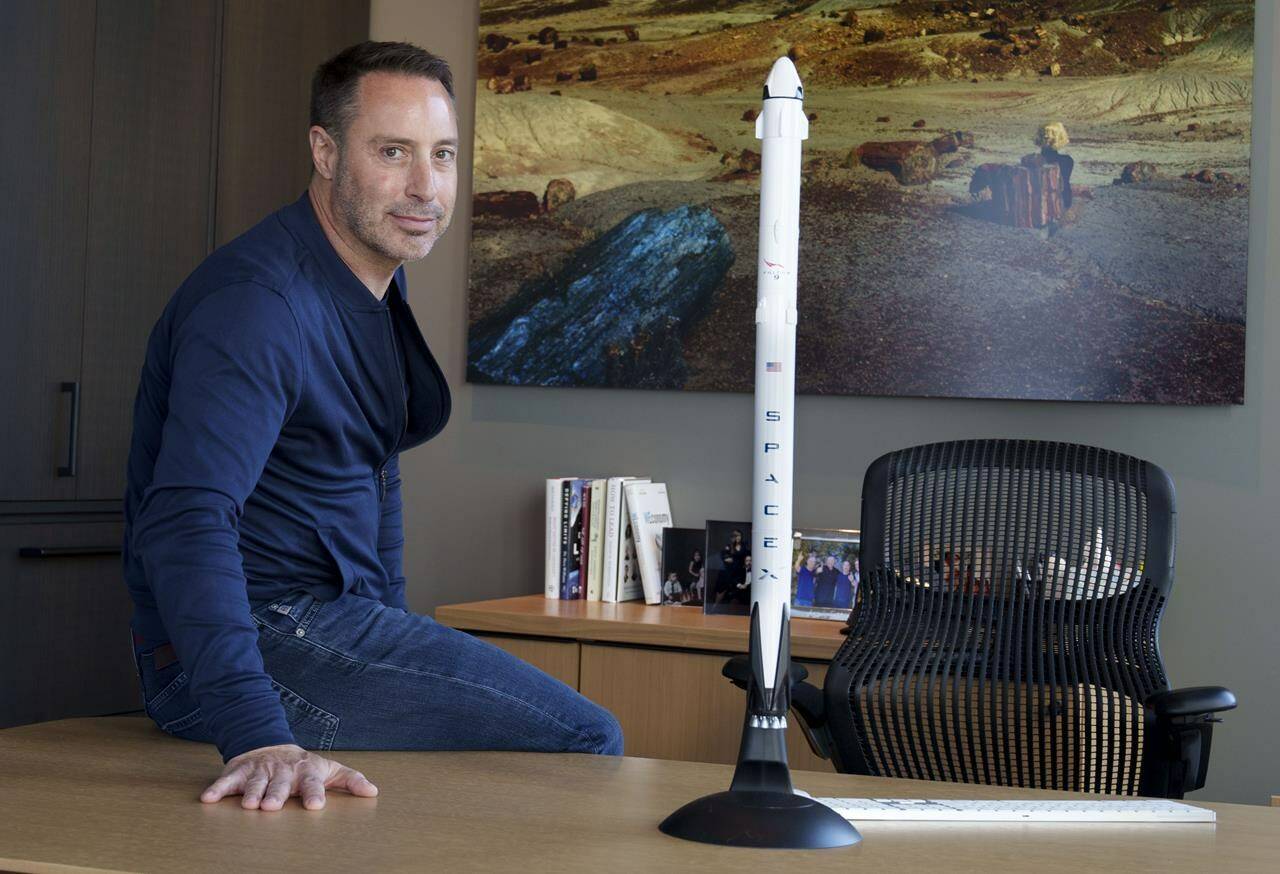 Mark Pathy is seen in his office with a model of the SpaceX starship in Montreal on Monday, November 8, 2021. Pathy is slated to embark in February on a 10-day journey on the maiden voyage of Texas-based Axiom Space paying about 50 million dollars US for the privilege. THE CANADIAN PRESS/Paul Chiasson