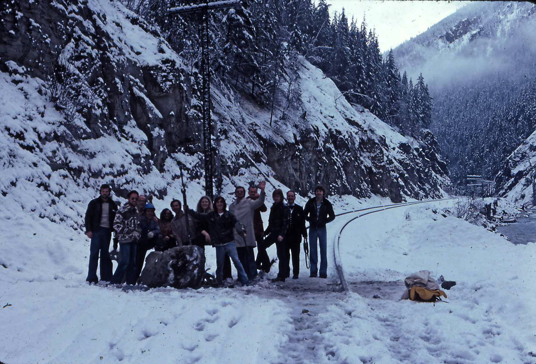 This group of CP Rail passengers helped remove rock from the tracks on Oct. 29, 1978. This photo, along with many other recently digitized photos, can be found in former CP conductor John Cowan’s new book. He hopes the book will help him reconnect with those helpful passengers that day. (John Cowan photo)