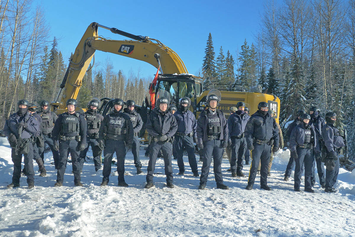 RCMP deployed at Morice Forest Service Road to enforce a B.C. Supreme Court injunction granting Coastal GasLink access to a worksite near Houston. (Gidimt’en Checkpoint Facebook photo)