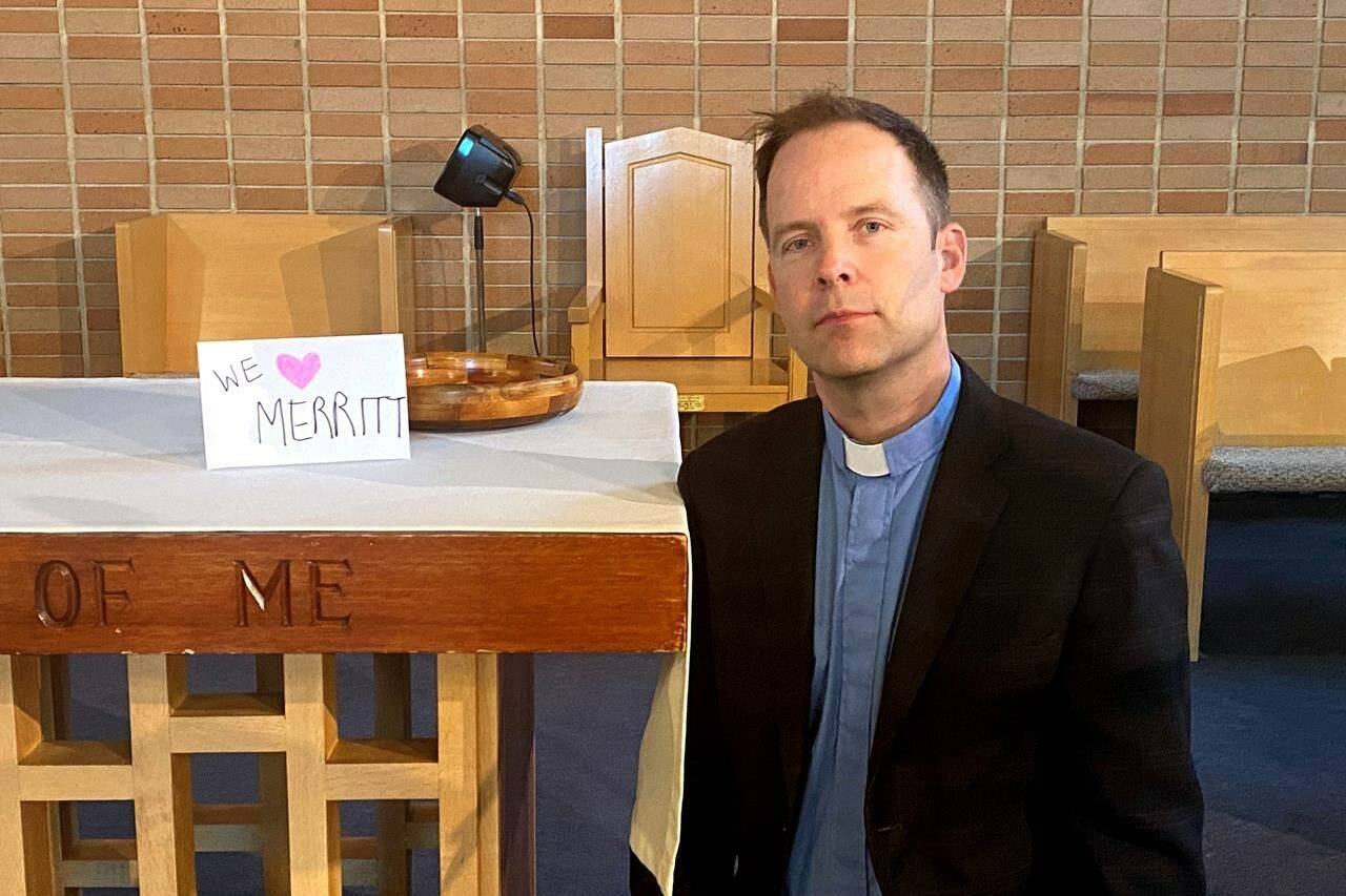 Pastor Steve Filyk poses for a photo at St. Andrew’s Presbyterian Church in Kamloops, B.C. on Sunday, Nov. 21, 2021. Filyk urged his followers Sunday to help those suffering from the flooding at a time the world appears particularly dark. THE CANADIAN PRESS/Bill Graveland