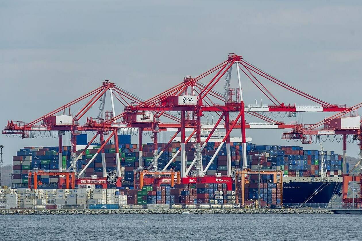 The container ship CMA CGM Marco Polo unloads cargo at the PSA Halifax container berth in Halifax on Tuesday, May 18, 2021. Canada is considering an international proposal that would double the ambition of its greenhouse gas emissions targets from shipping. THE CANADIAN PRESS/Andrew Vaughan