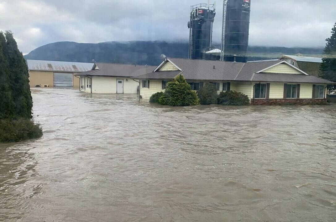 Flooding on the de Leeuw family farm is seen on the Sumas Prairie in a Nov. 23, 2021, handout photo. Tiffany de Leeuw says her in-laws don’t expect to be able to fully access the property for a few weeks. THE CANADIAN PRESS/HO-Tiffany de Leeuw