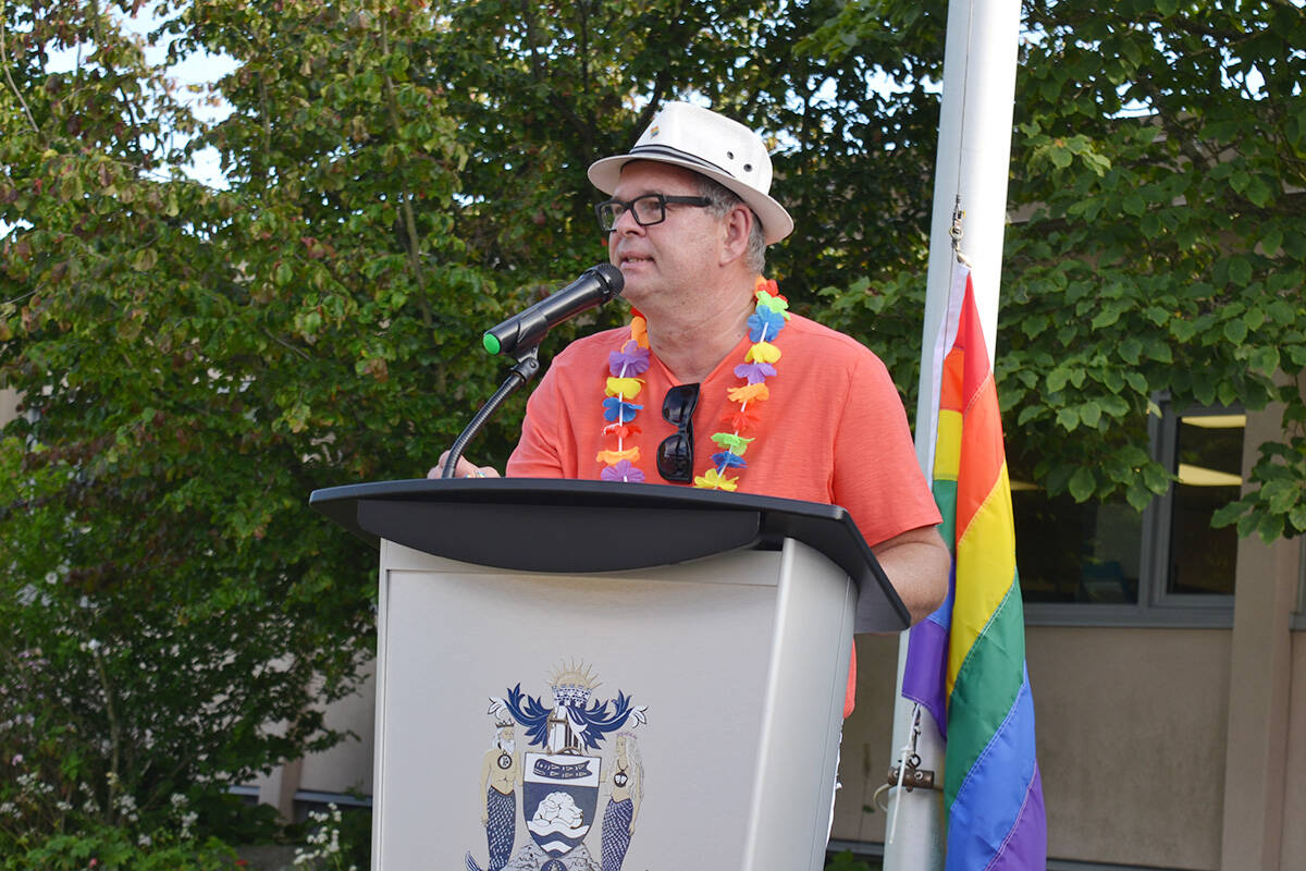 White Rock Pride Society president Ernie Klassen speaks to guests at the flag raising ceremony in 2019. (File photo)