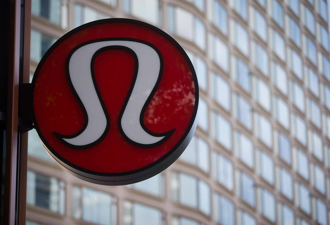 Lululemon Athletica’s logo is seen on the outside of their new flagship store on Robson Street during it’s grand opening in downtown Vancouver, B.C., on Thursday August 21, 2014. THE CANADIAN PRESS/Darryl Dyck