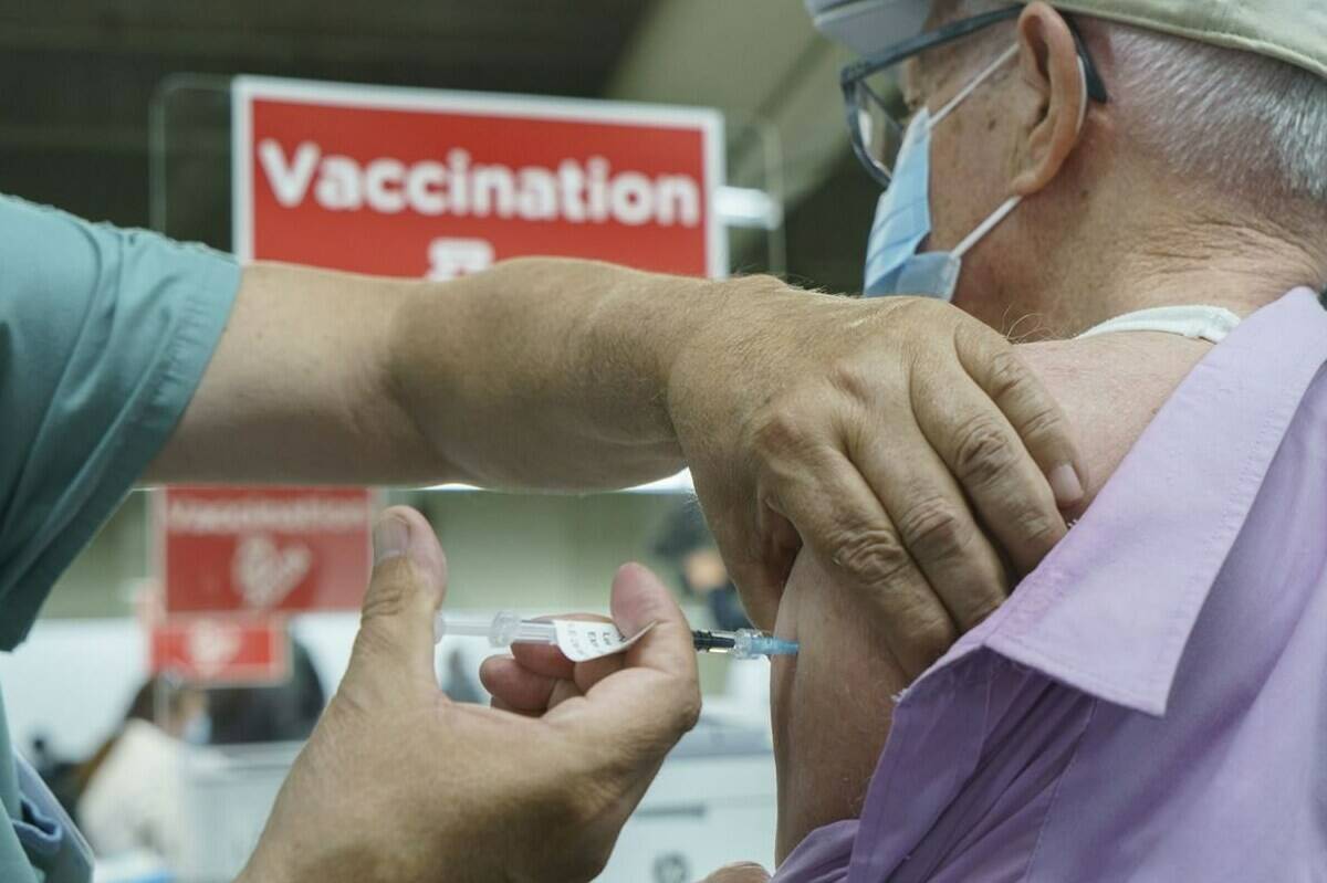 UBC research has yielded results suggesting waiting longer between COVID-19 vaccinations leads to better immunity. Pictured here vaccinations in Montreal in March. (THE CANADIAN PRESS/Paul Chiasson)