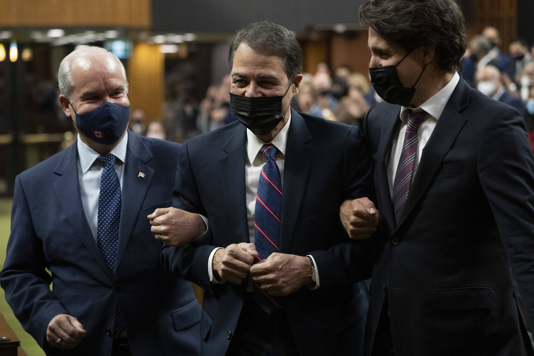 Anthony Rota is escorted by Prime Minister Justin Trudeau and Conservative leader Erin O’Toole to the Speakers chair after being elected as the Speaker of the House of Commons Monday, November 22, 2021 in Ottawa. THE CANADIAN PRESS/Adrian Wyld