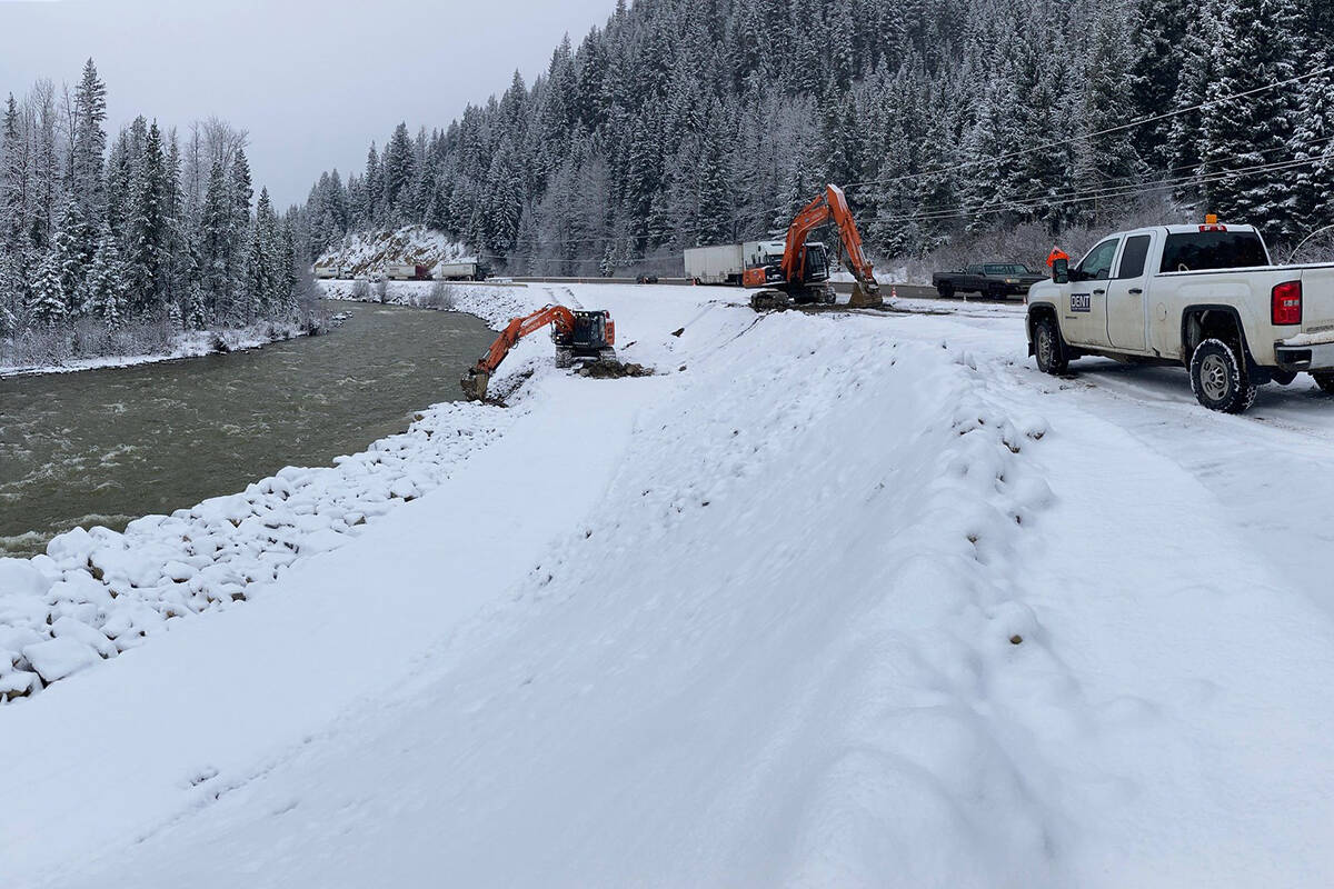 Crews build an erosion control embankment along Hwy. 3 on Saturday, Dec. 4, 2021. (B.C. Ministry of Transportation and Infrastructure)