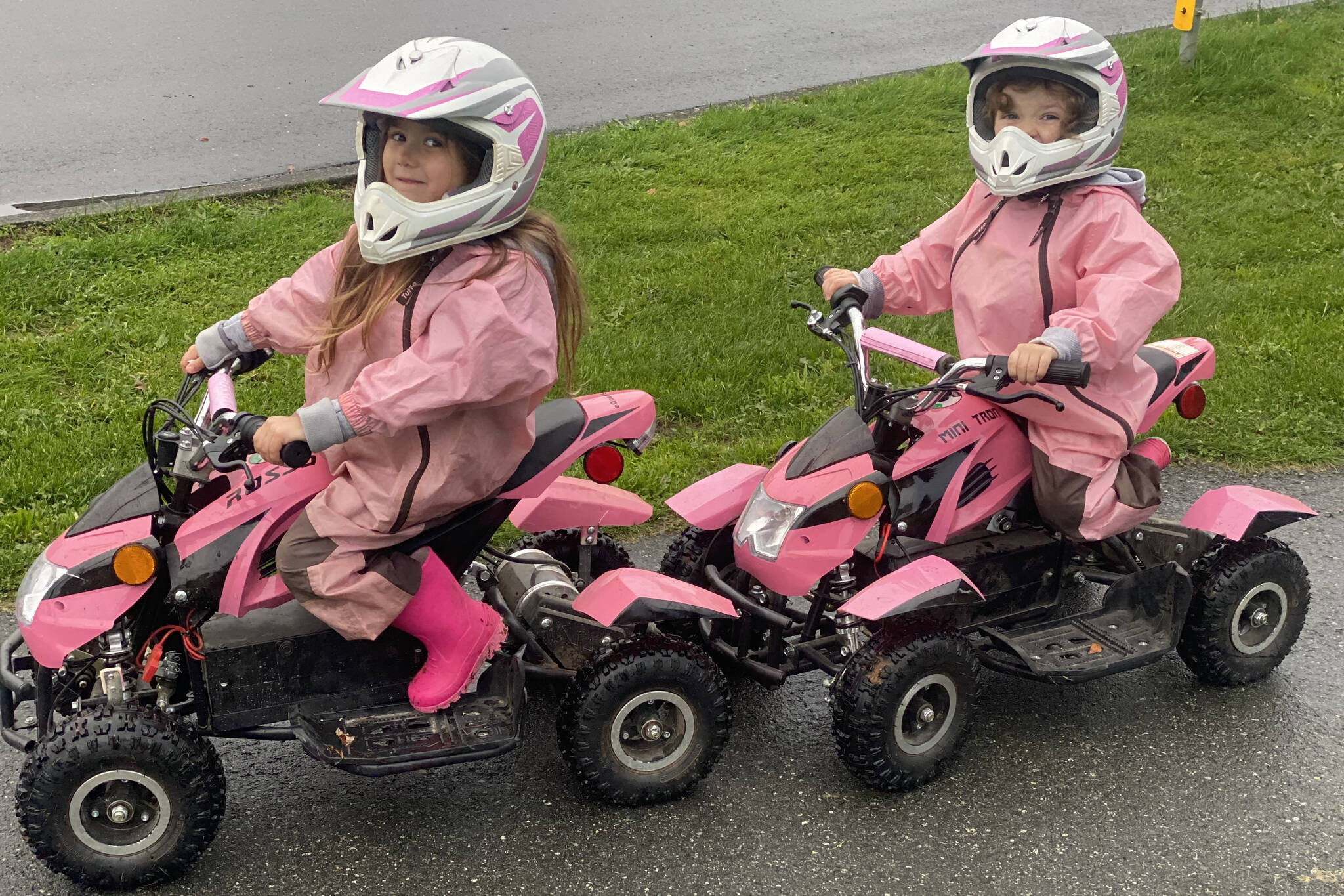 Amelia and Aria D’Angelo, aged five and three, on their pink electric ATVs that were stolen from their parents garage in Chilliwack on Dec. 5, 2021. (Submitted by Gwendolyn D’Angelo)