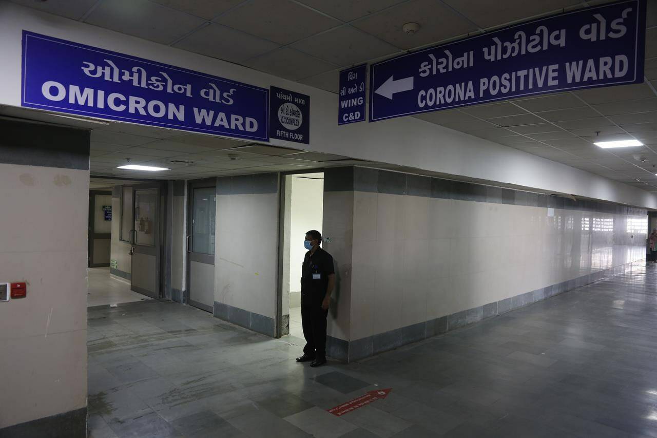 A security guard stands in position outside a ward being prepared for the Omicron coronavirus variant at Civil hospital in Ahmedabad, India, Monday, Dec. 6, 2021. Within hours of the World Health Organization designating Omicron a variant of concern late last month, Moderna issued a press release telling the public it was already working on a vaccine booster that could target the new threat. THE CANADIAN PRESS/AP-Ajit Solanki