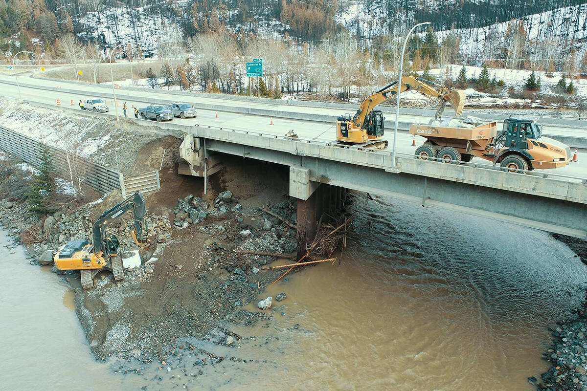Crews work to repair the Coquihalla at Kingsvale Bridge, about 38 km south of Merritt, on Saturday, Nov. 27, 2021. (B.C. Ministry of Transportation and Infrastructure)